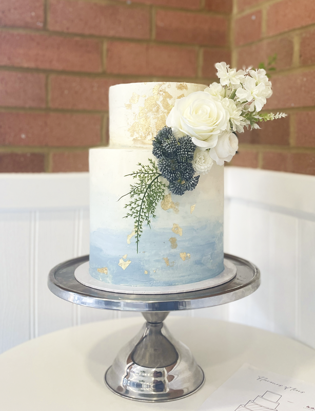 2 tier wedding cake in buttercream